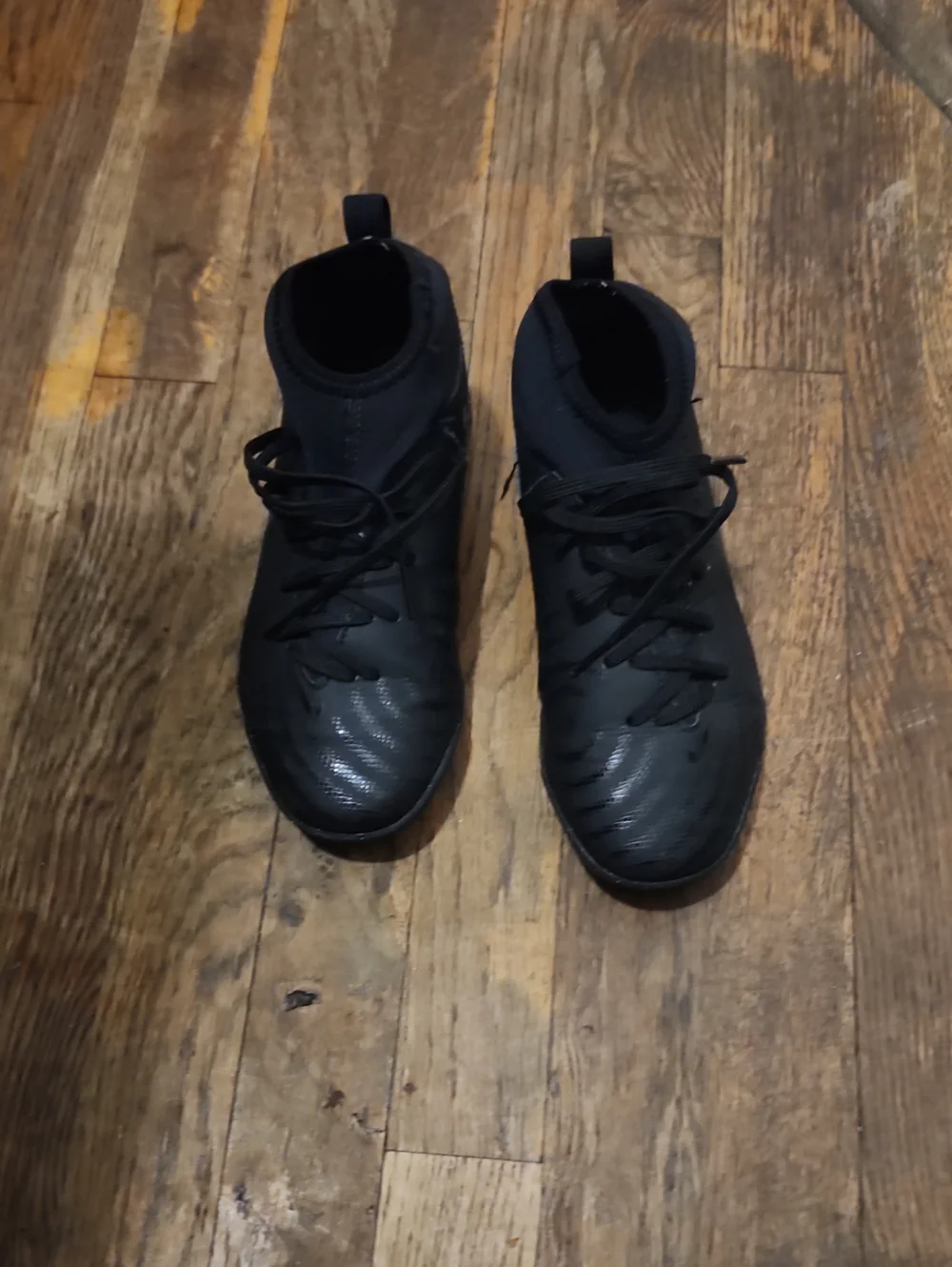Black Nike Phantom Luna 2 high-top soccer sneakers